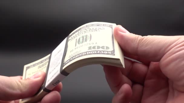 Leafing through a stack of banknotes — Stock Video