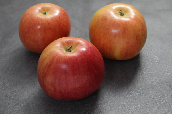 Red apple, a useful product for health, full of vitamins.