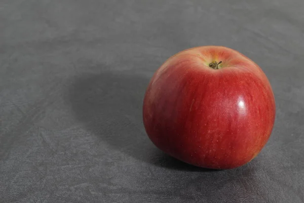 Red apple, a useful product for health, full of vitamins.