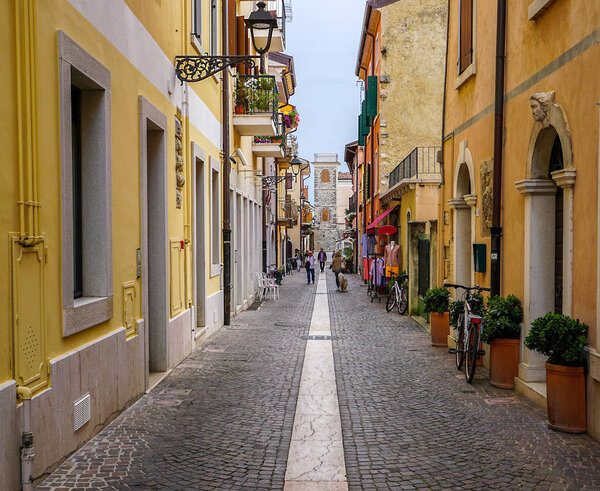 A small colorful street in Bordolino, Italy.