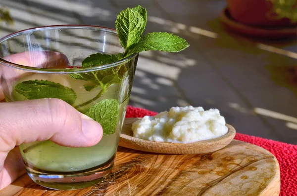 A kefir drink with mint leaves — Stock Photo, Image