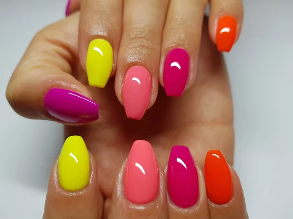 Beautiful colorful nails and hand manicure. — Stock Photo, Image