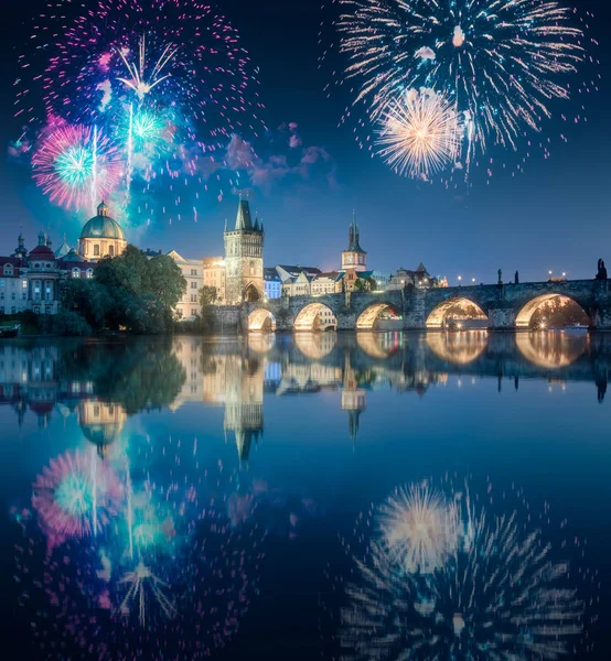 Beautiful fireworks above Charles bridgeat at night, Prague, Czech Republic