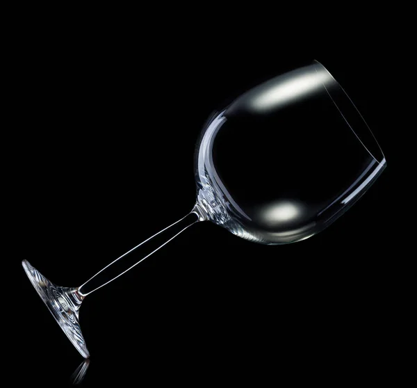 Empty glass for red wine isolated on black background. — Stock Photo, Image