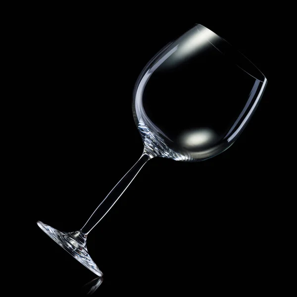 Empty glass for red wine isolated on black background. — Stock Photo, Image