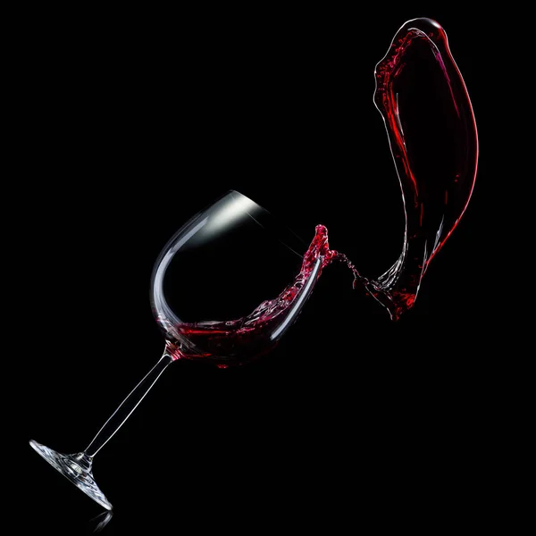 Szkło do czerwonego wina z rozpryskami wyizolowanymi na czarnym tle. — Zdjęcie stockowe