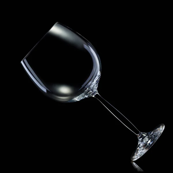 Empty glass for red wine isolated on black background. — Stock Photo, Image