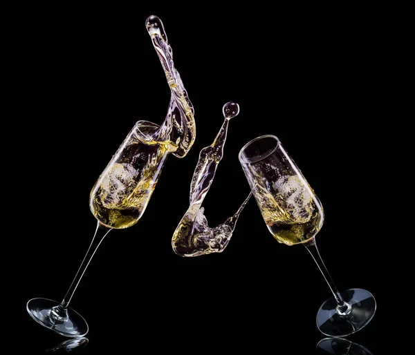 Set of luxury champagne glasses isolated on a black background — Stock Photo, Image