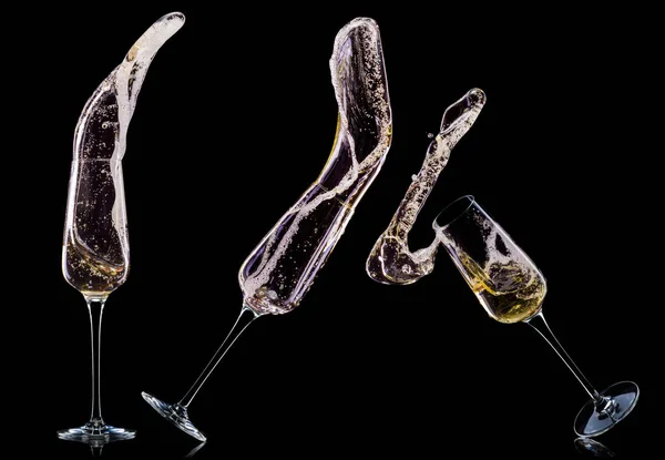 Set of luxury champagne glasses isolated on a black background — Stock Photo, Image