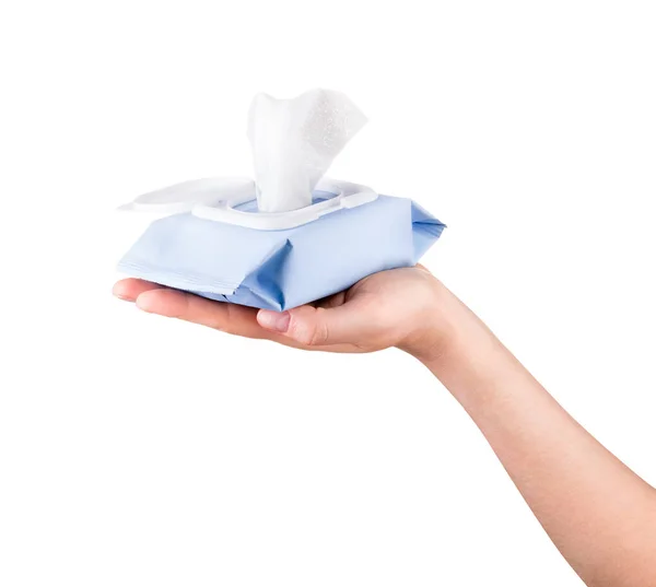 Woman hand holding package of wet wipes or tissue isolated on a white background — Stock Photo, Image