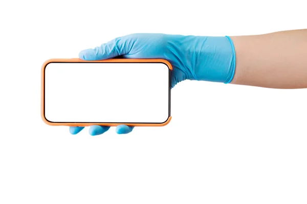 Doctors hand in medical gloves holding phone isolated on white — Stock Photo, Image