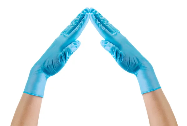 Médecins main dans des gants médicaux stériles montrant la forme du cœur isolé sur blanc — Photo