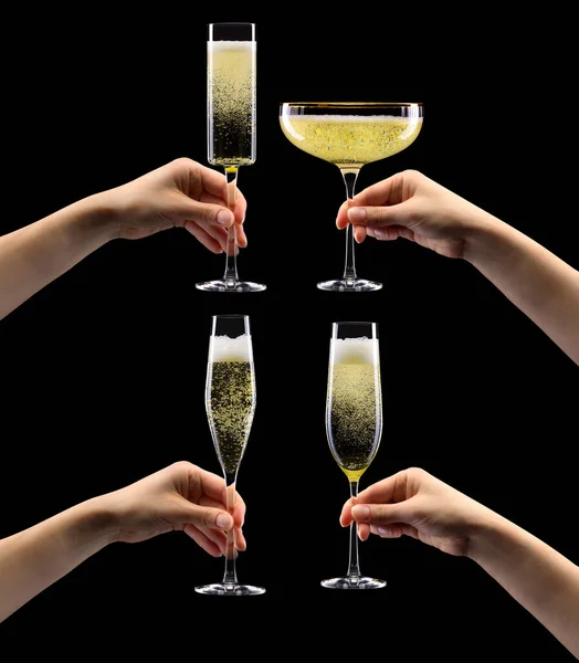 Uppsättning händer håller glas av mousserande champagne isolerad på svart. — Stockfoto