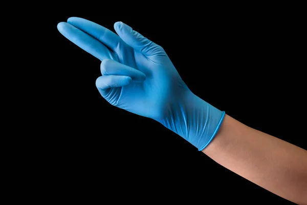 Doctors hand in medical gloves showing two fingers up in peace symbol isolated — Stock Photo, Image