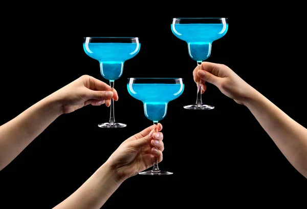 Set Hands Holding Blue Curacao Margarita Glass Isolated Black Background — Stock Photo, Image