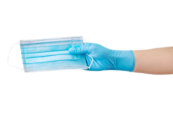 Médecins main dans les gants médicaux donner à quelqu'un un un masque isolé sur blanc — Photo