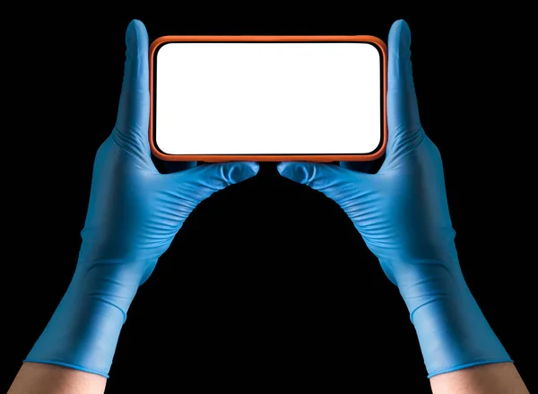 Médicos entregan guantes médicos sosteniendo el teléfono y jugando juegos aislados —  Fotos de Stock