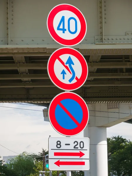 Various traffic signs on Japan road. The speed limited and no u-turn traffic sign symbols.