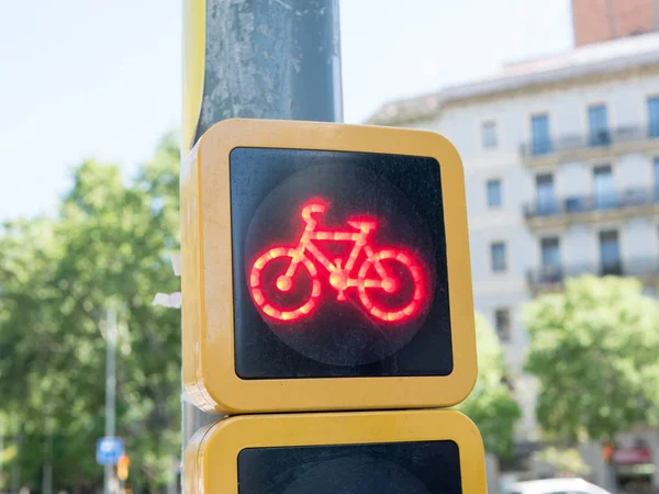 Close up of a red stop light for cyclists on a european cycle route in a city centre.