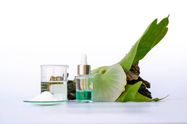 Cosmetic chemicals ingredient on white laboratory table. Cetyl esters wax, alcohol, Lavanya Huryali (Green).