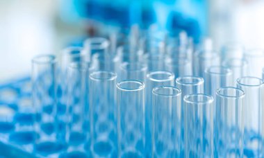 Closeup test tube in chemical laboratory background, science laboratory research and development concept.