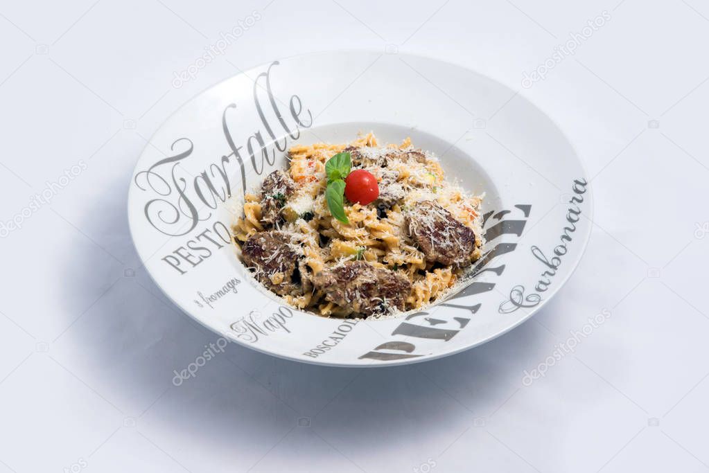 A high contrast Hero shot of a Meat & sprinkled Cheese Pasta, on a minimal white background with a 45 degree angle from zoomed out frontal perspective