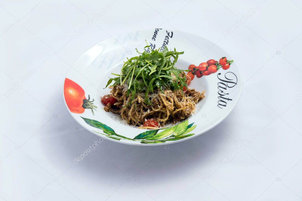 A high contrast Hero shot of a Tuna pasta /  tuna tapenade with olives, tomato & salad, on a minimal white background with a 60 degree angle from zoomed frontal perspective