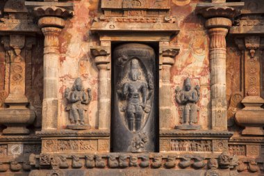 Koshta image of Lingodbhava or Shiva emerging from a linga. West wall of the Vimana. Airavatesvara Temple, UNESCO World Heritage Site, Darasuram, near Kumbakonam, Tamil Nadu, India clipart