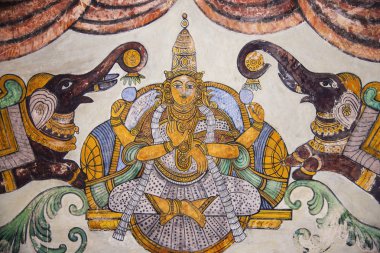Nayaka painting of Gajalakshmi on the inside wall of the cloister mandappa. Brihadishvara Temple, Thanjavur, Tamil Nadu clipart