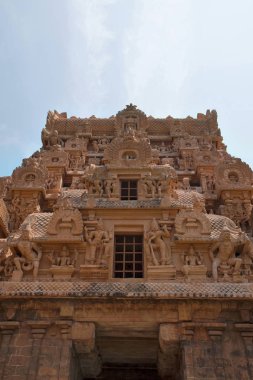 Carvings on Gopura, Keralantakan Tiruvasal, Second entrance gopura, Brihadisvara Temple, Tanjore, Tamil Nadu, India. View from West clipart