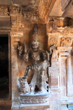 Dwarapala on the right, Subrahmanyam shrine, Brihadisvara Temple complex, Tanjore, Tamil Nadu, India clipart