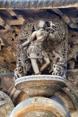 Decorative friezes with animals, dancers and other figures, Chennakeshava temple. Belur, Karnataka, India clipart