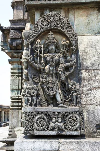 Ornate wall panel reliefs depicting Goddess Kali. Ranganayaki, Andal, temple, Chennakesava temple complex, Belur, Karnataka, india West wall — Stock Image Ornate Wall Panel Reliefs Depicting Goddess Kali Ranganayaki Andal Temple Royalty Free Stock Photos