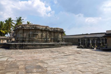 The compact and ornate Veeranarayana temple, Chennakeshava temple complex, Belur, Karnataka, India. View from North. clipart