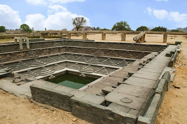 Stepped Tank. Hampi, Karnataka, India. A chain of aqueducts used to bring water from Kamalapura tank to fill this tank is clearly seen here.