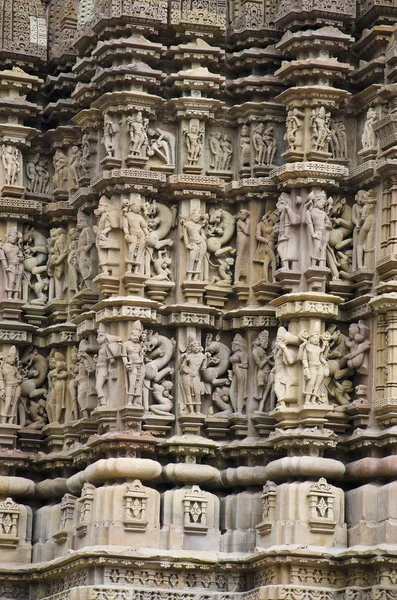 DEVI JAGDAMBI TEMPLE, Wall - Deities surrounded by surasundaries in various poses and Vyalas, Western Group, Khajuraho, Madhya Pradesh, India, UNESCO World Heritage Site