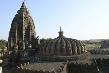 Low height shikhara over mandapam and high shikhara over Garbhagriha at Vitthal Temple, Palashi, Parner, Ahmednagar clipart