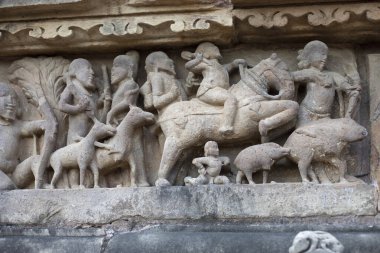 Avlanan insanların heykeli, Khajuraho, Madhya Pradesh, Hindistan