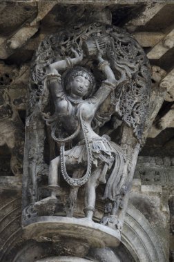 Chennakeshava Tapınağı kompleksinin dış duvarına oyulmuş heykeller, 12. yüzyıl Hindu tapınağı Lord Vishnu, Belur, Karnataka, Hindistan 'a ithaf edilmiştir.