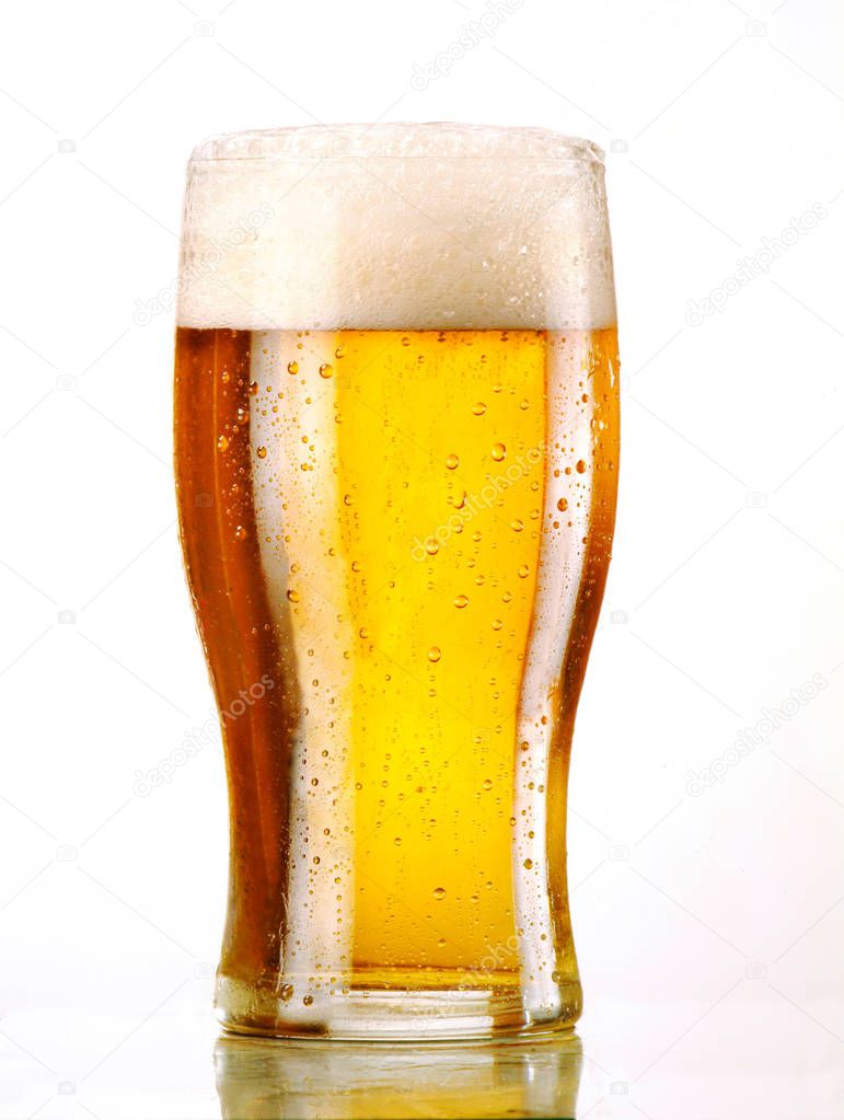 glass of cold beer with foam
