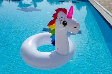 Unicorn inflatable float for kids and adult. Unicorn swim tube o clipart