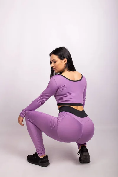 Visão Traseira Mulher Esportiva Vestindo Leggings Sexy Isolado Sobre Fundo — Fotografia de Stock