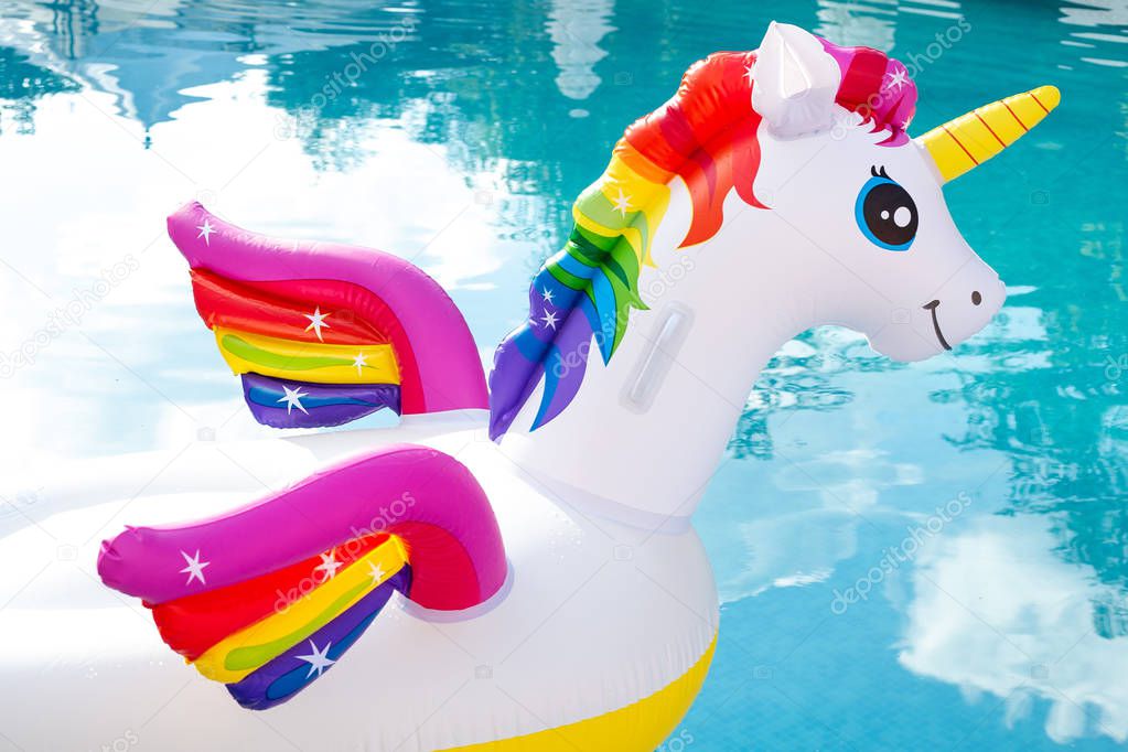Head of unicorn inflatable pool float. Summer holidays, beach va