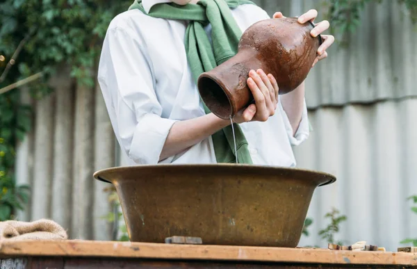 Boy White Shirt Green Sweater Holds Clay Jug Pours Water — Stock Photo, Image