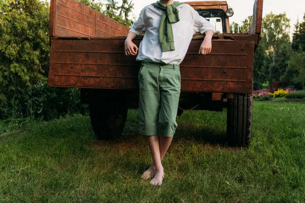 Boy White Shirt Green Pants Green Sweater His Neck Leaning — Stock Photo, Image