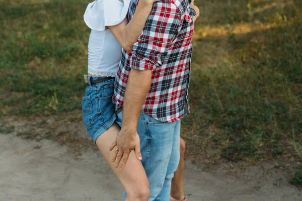 Girl Jumped Guy Back Holds Her Legs Check Shirt Jeans — Stock Photo, Image