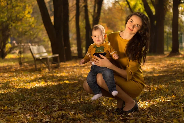 Happy Young Mother Playing Baby Autumn Park Yellow Maple Leaves — Stock Photo, Image