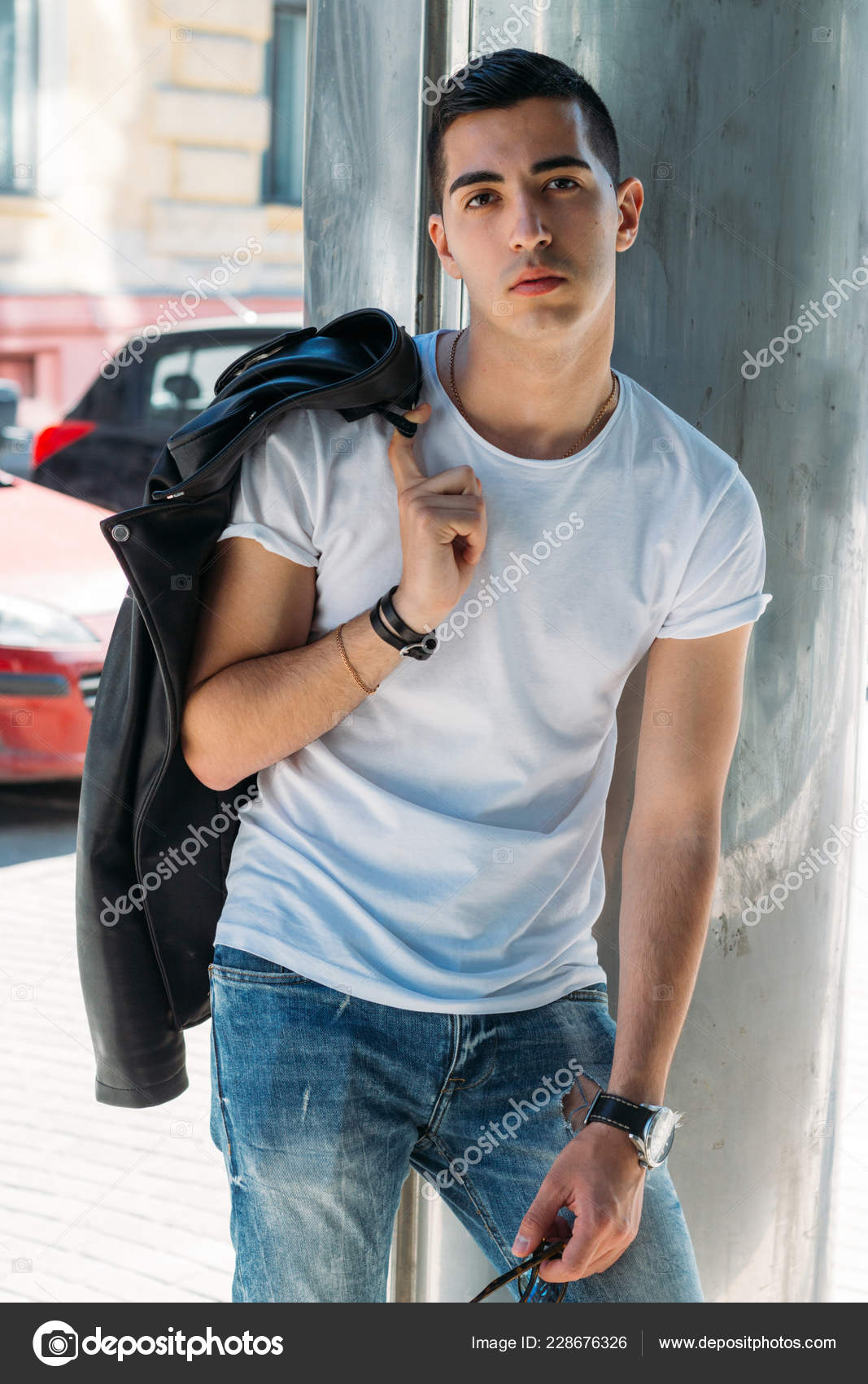 Young Handsome Guy White Shirt Black Leather Jacket Blue Torn