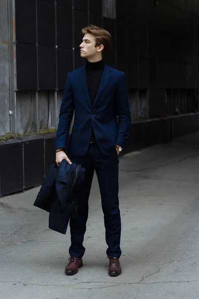 Portrait Attractive Young Man Blue Suit City Black Background Watch — Stock Photo, Image