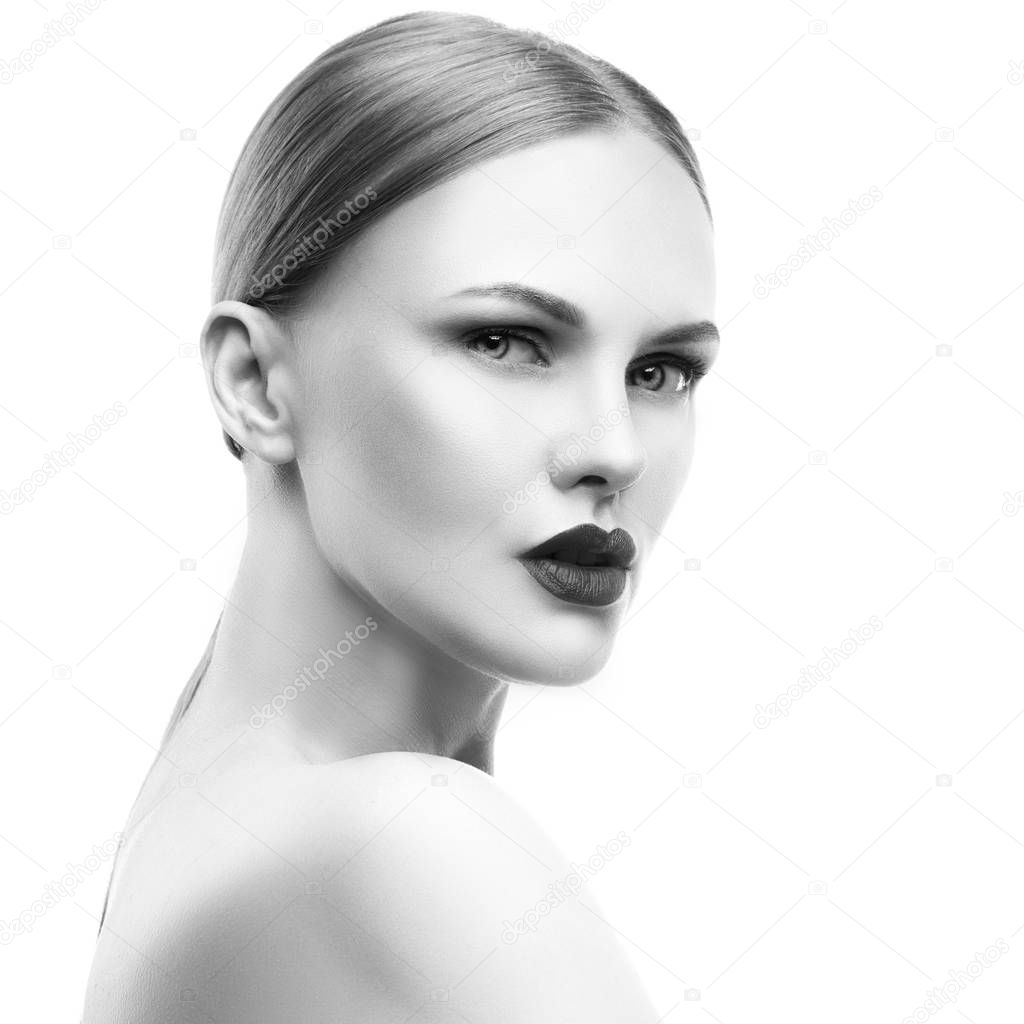 portrait of young woman with natural makeup and dark lips on white background